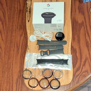 Google Pixel Watch with Black and Silver Bands